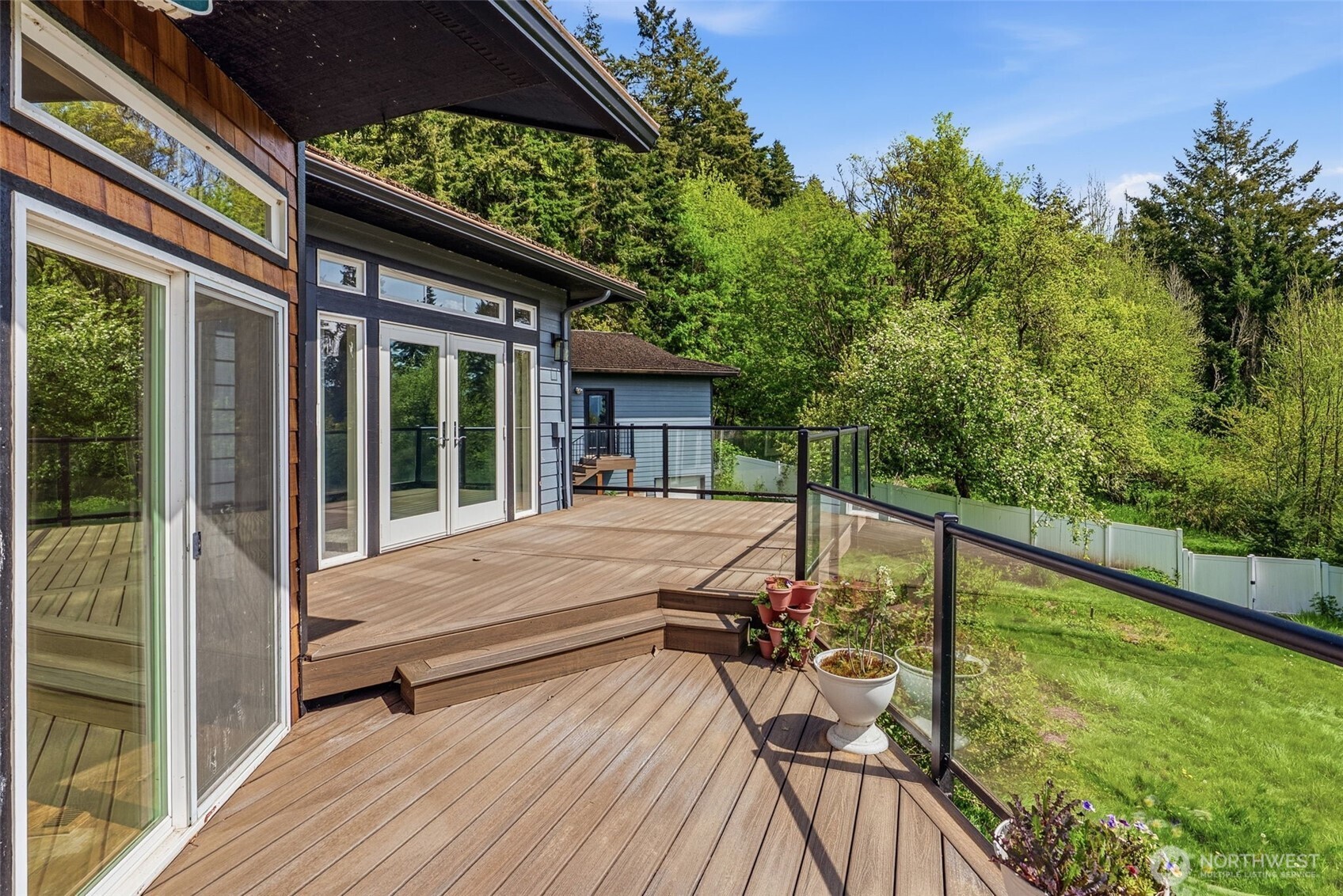 16 Little Cape Horn Road Cathlamet, WA 98612 - Photo 27 of 32 a view of house with swimming pool and porch with furniture