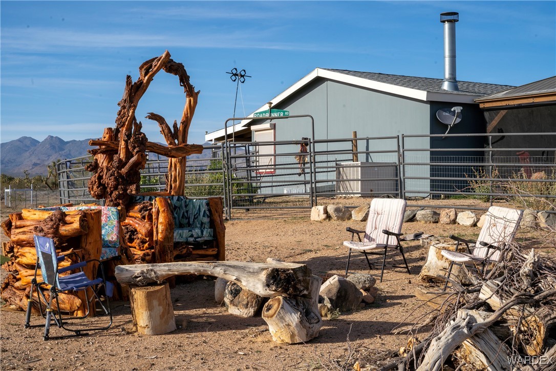 7190 East Red Barrel Road Yucca, AZ 86438 - Photo 53 of 65 Firepit and Custom Chairs