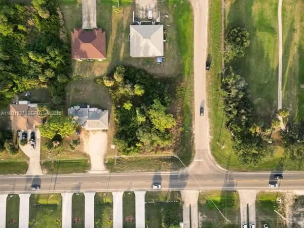 an aerial view of residential building with parking space