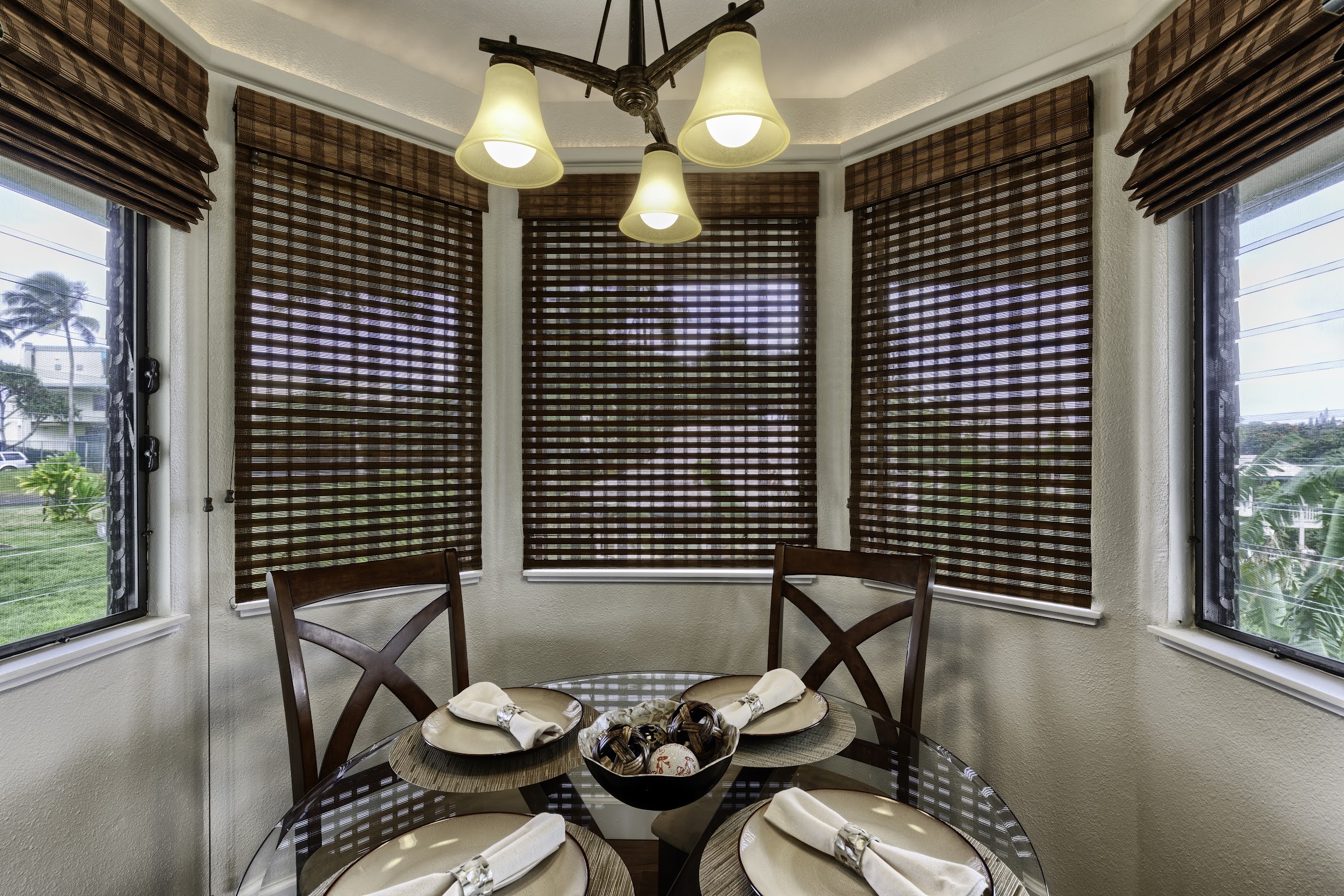 5451 Ka Haku Road, Unit 8 Princeville, HI 96722 - Photo 6 of 14 a view of a balcony table and chairs