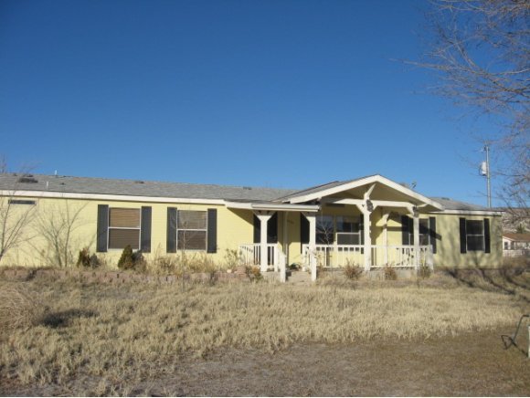 3534 Mahoney Road Camp Verde, AZ 86322 - Photo 1 of 7 a front view of a house with a yard