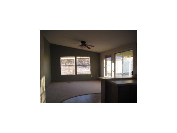 3534 Mahoney Road Camp Verde, AZ 86322 - Photo 4 of 7 a living room with a bed furniture and a window
