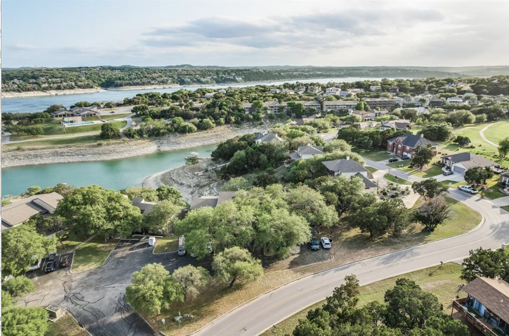 Undisclosed Address Point Venture, TX 78645 - Photo 28 of 31 an aerial view of a city with lots of residential buildings ocean and mountain view in back