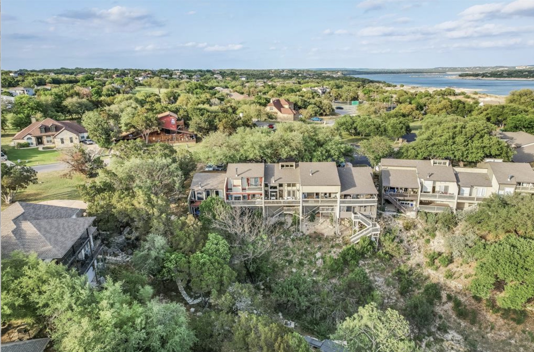 Undisclosed Address Point Venture, TX 78645 - Photo 30 of 31 an aerial view of residential house with outdoor space and trees all around
