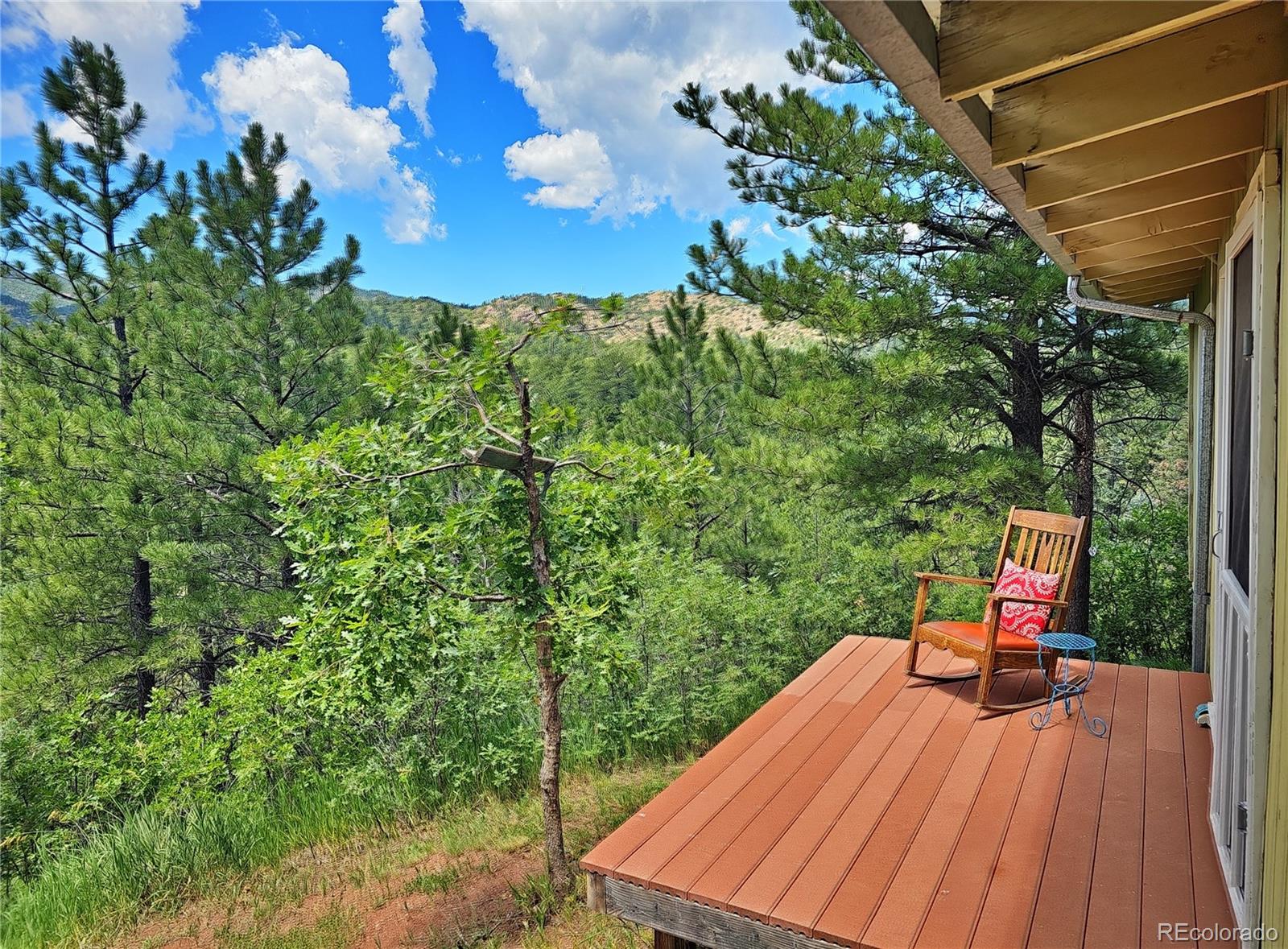 8929 Apache Drive Beulah, CO 81023 - Photo 25 of 43 a view of roof deck with chair and wooden floor