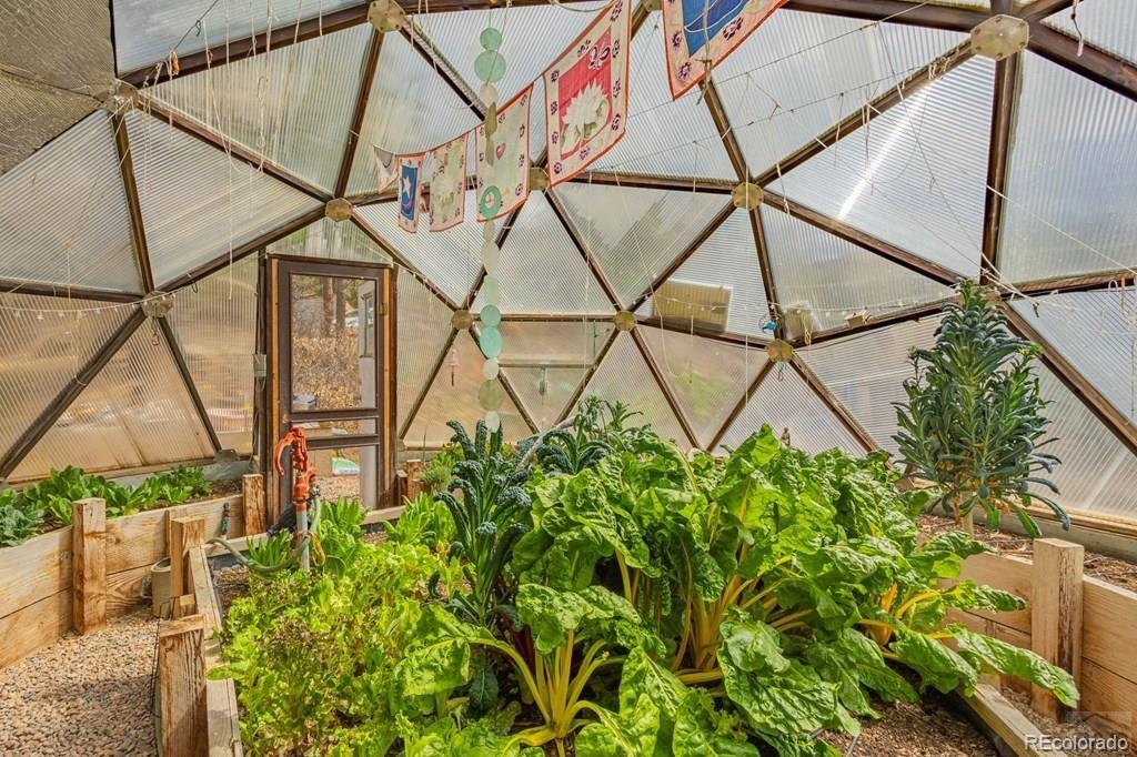 8929 Apache Drive Beulah, CO 81023 - Photo 31 of 43 a yellow umbrella sitting in front of a building