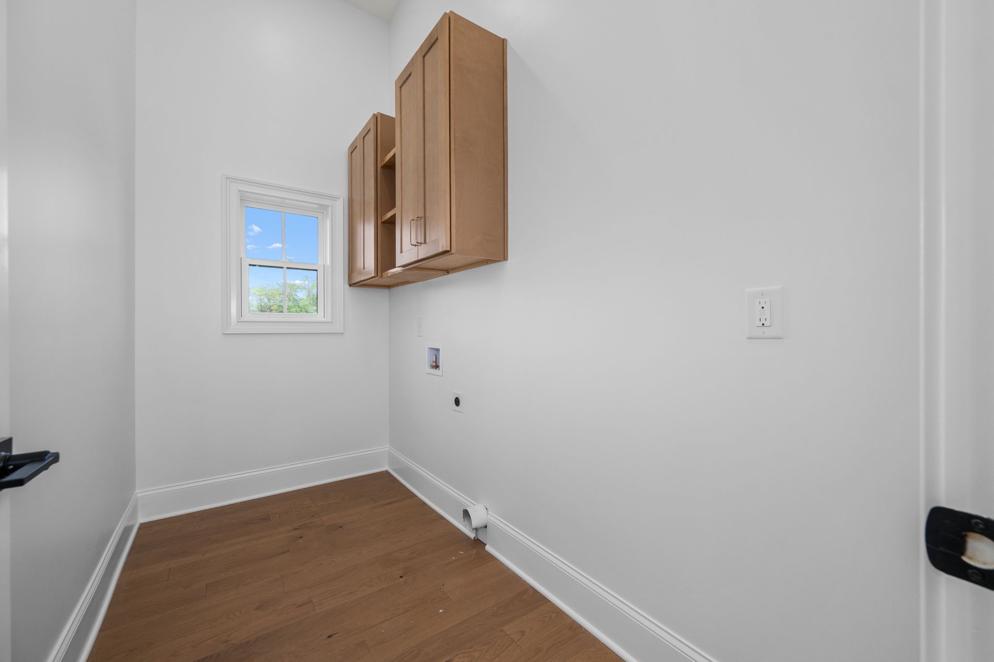 7838 Woodfin Road Christiana, TN 37037 - Photo 16 of 57 a view of a small space with wooden floor and a window