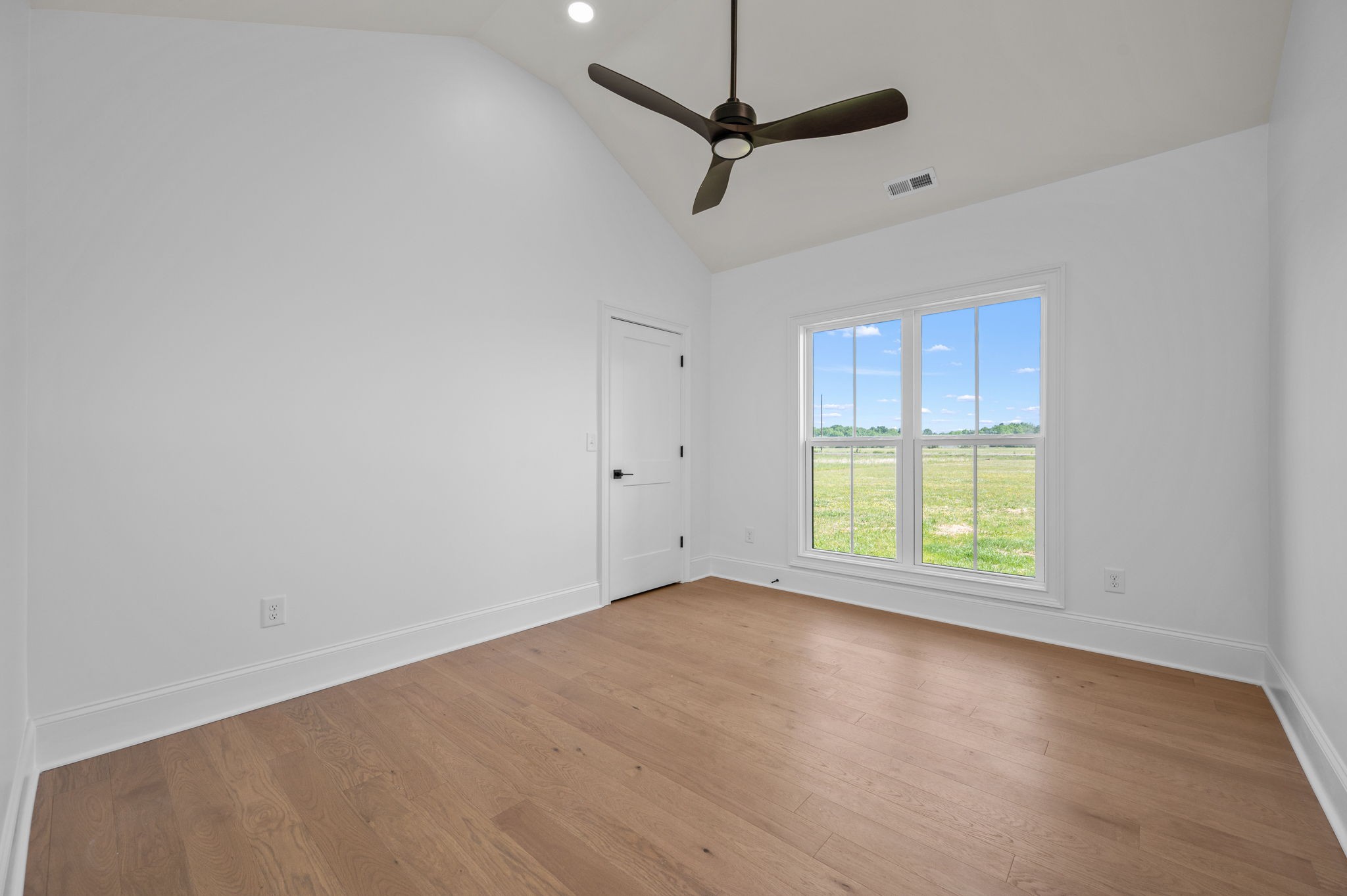 7838 Woodfin Road Christiana, TN 37037 - Photo 19 of 57 an empty room with window and windows