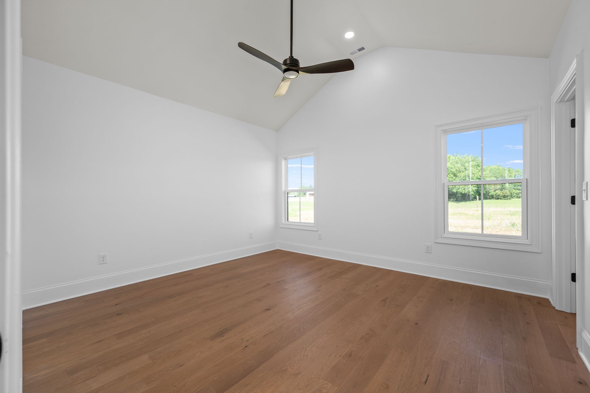 7838 Woodfin Road Christiana, TN 37037 - Photo 20 of 57 an empty room with a window and a ceiling fan