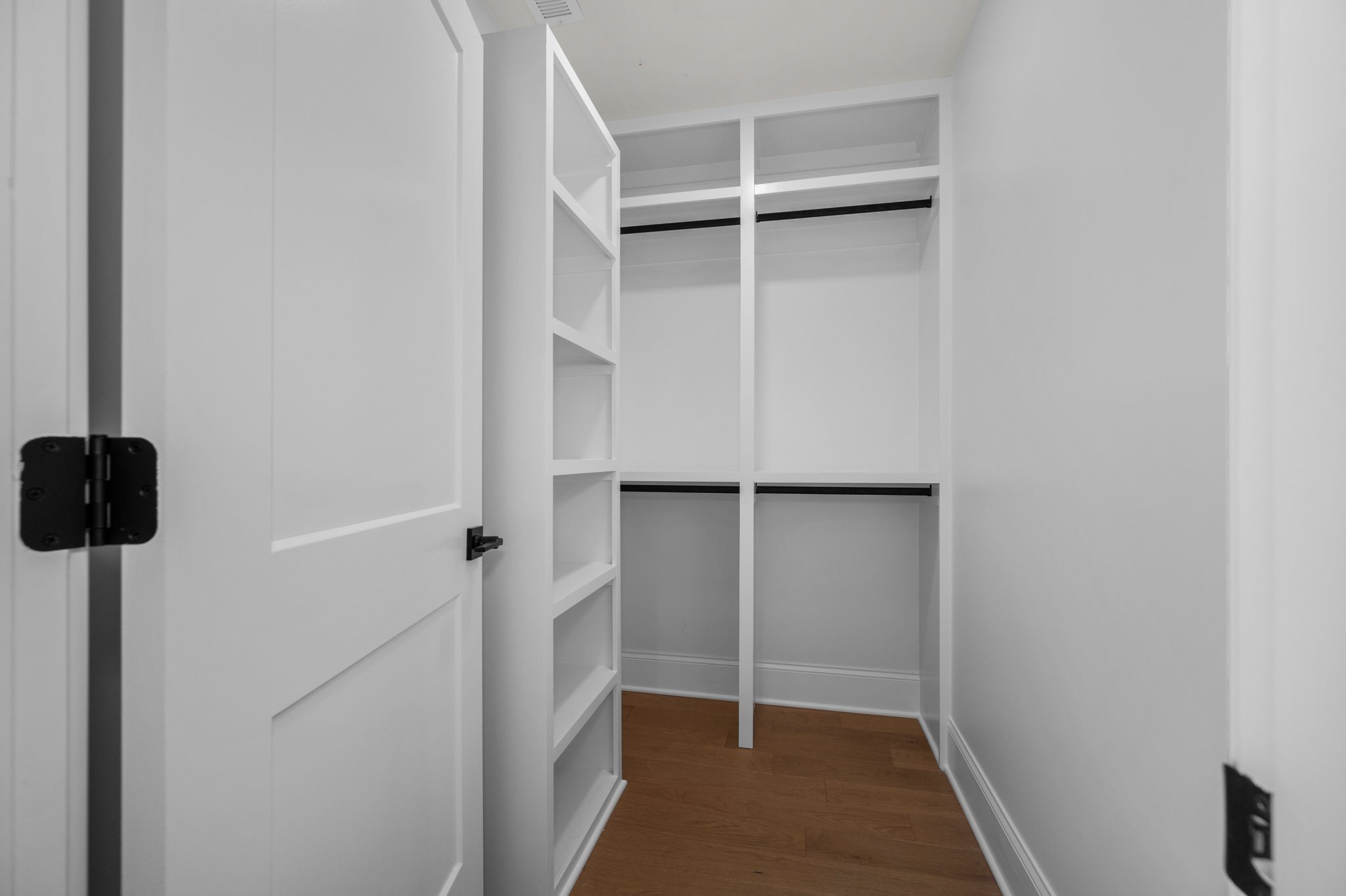 7838 Woodfin Road Christiana, TN 37037 - Photo 21 of 57 a view of walk in closet with empty racks