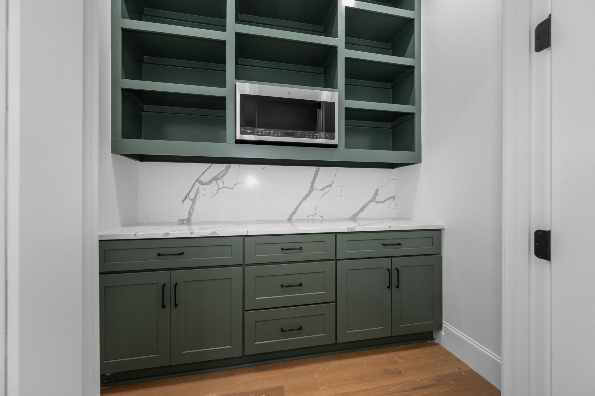 7838 Woodfin Road Christiana, TN 37037 - Photo 25 of 57 a view of cabinets and a wooden floor