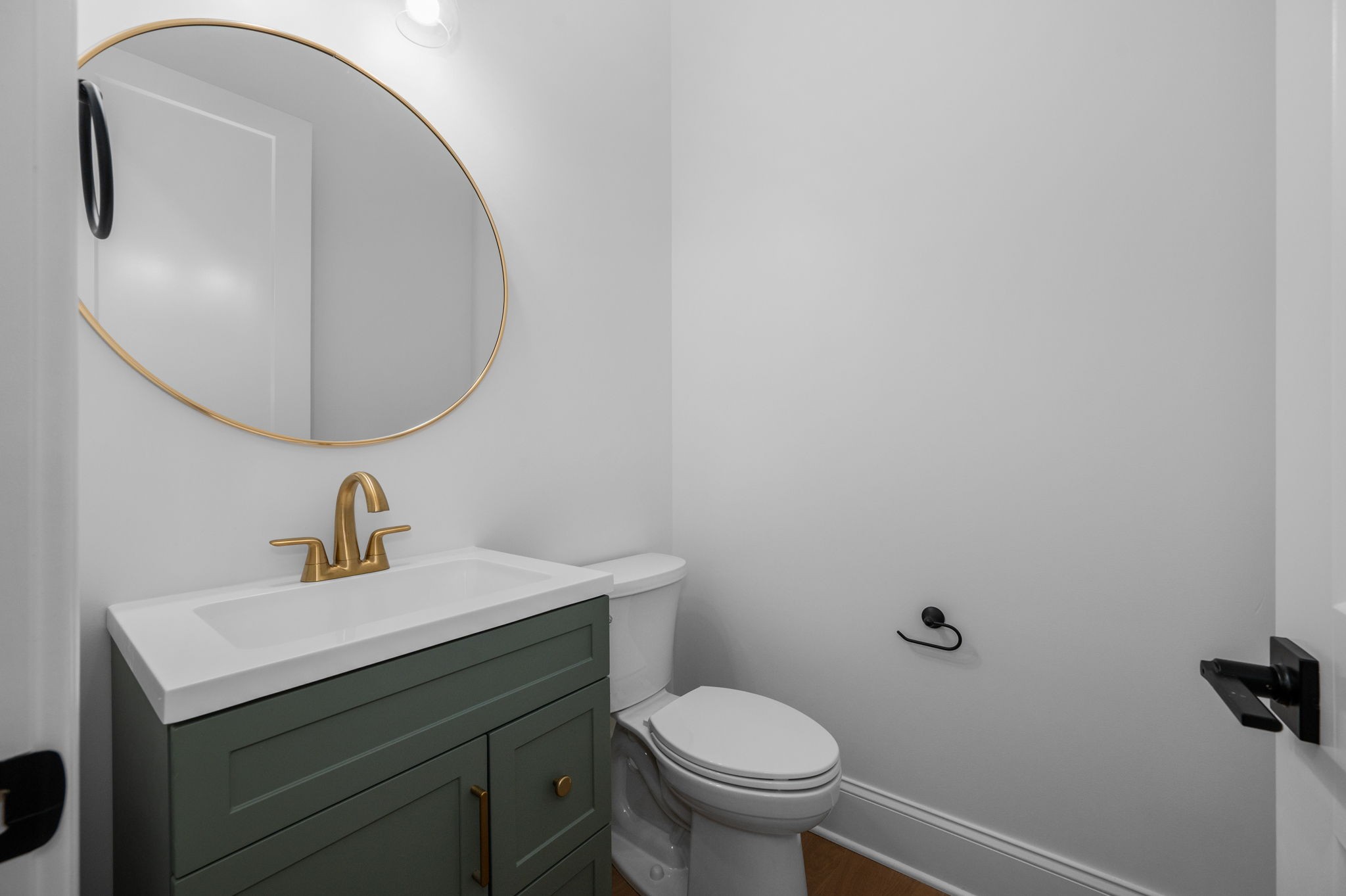 7838 Woodfin Road Christiana, TN 37037 - Photo 29 of 57 a bathroom with a sink a mirror and toilet