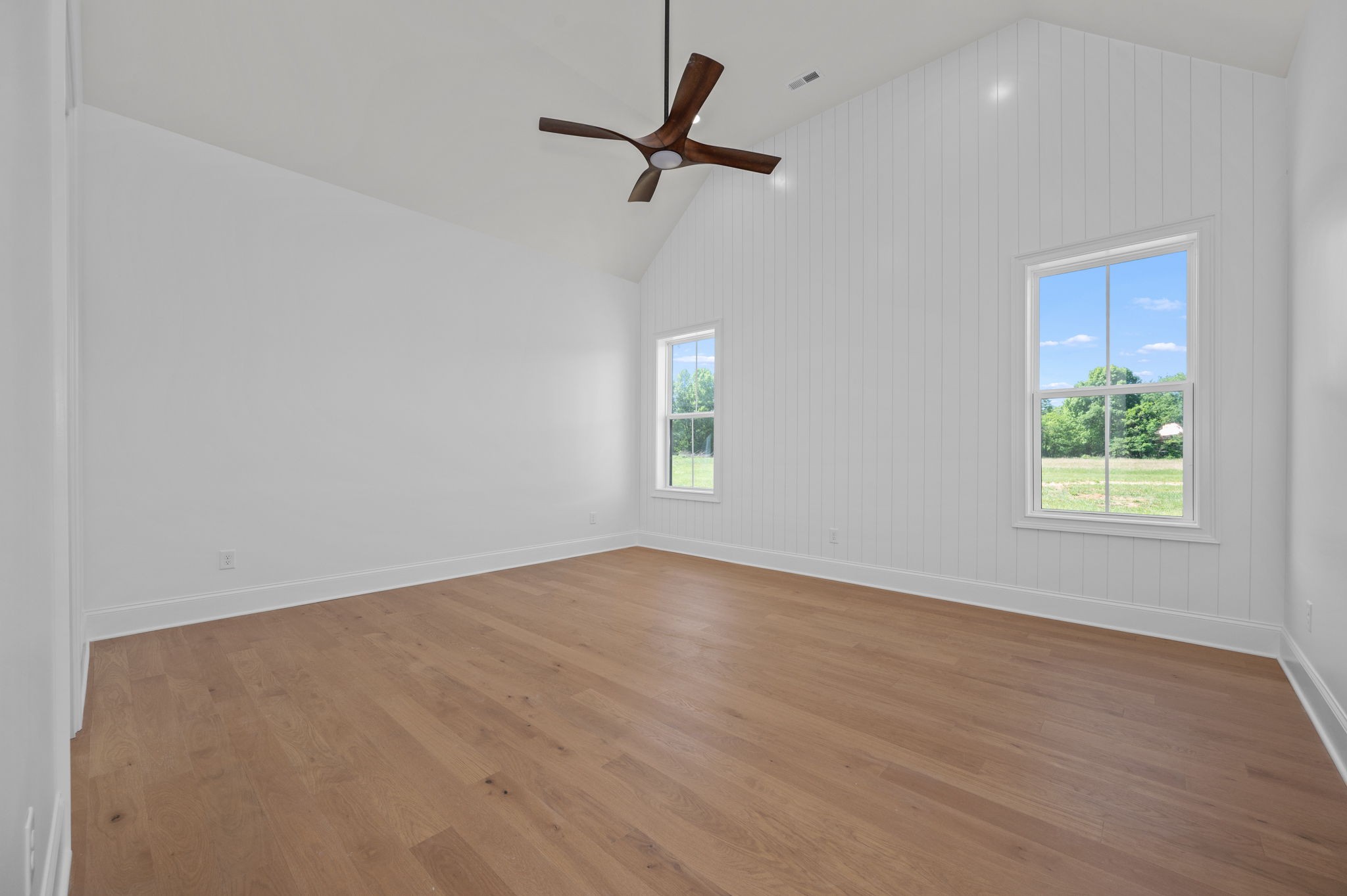 7838 Woodfin Road Christiana, TN 37037 - Photo 30 of 57 wooden floor in an empty room with a window