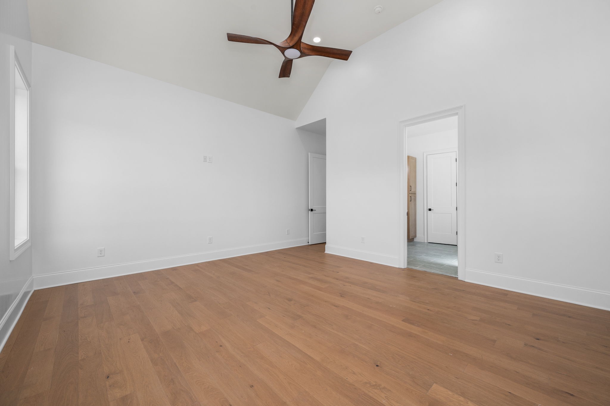 7838 Woodfin Road Christiana, TN 37037 - Photo 31 of 57 wooden floor in an empty room