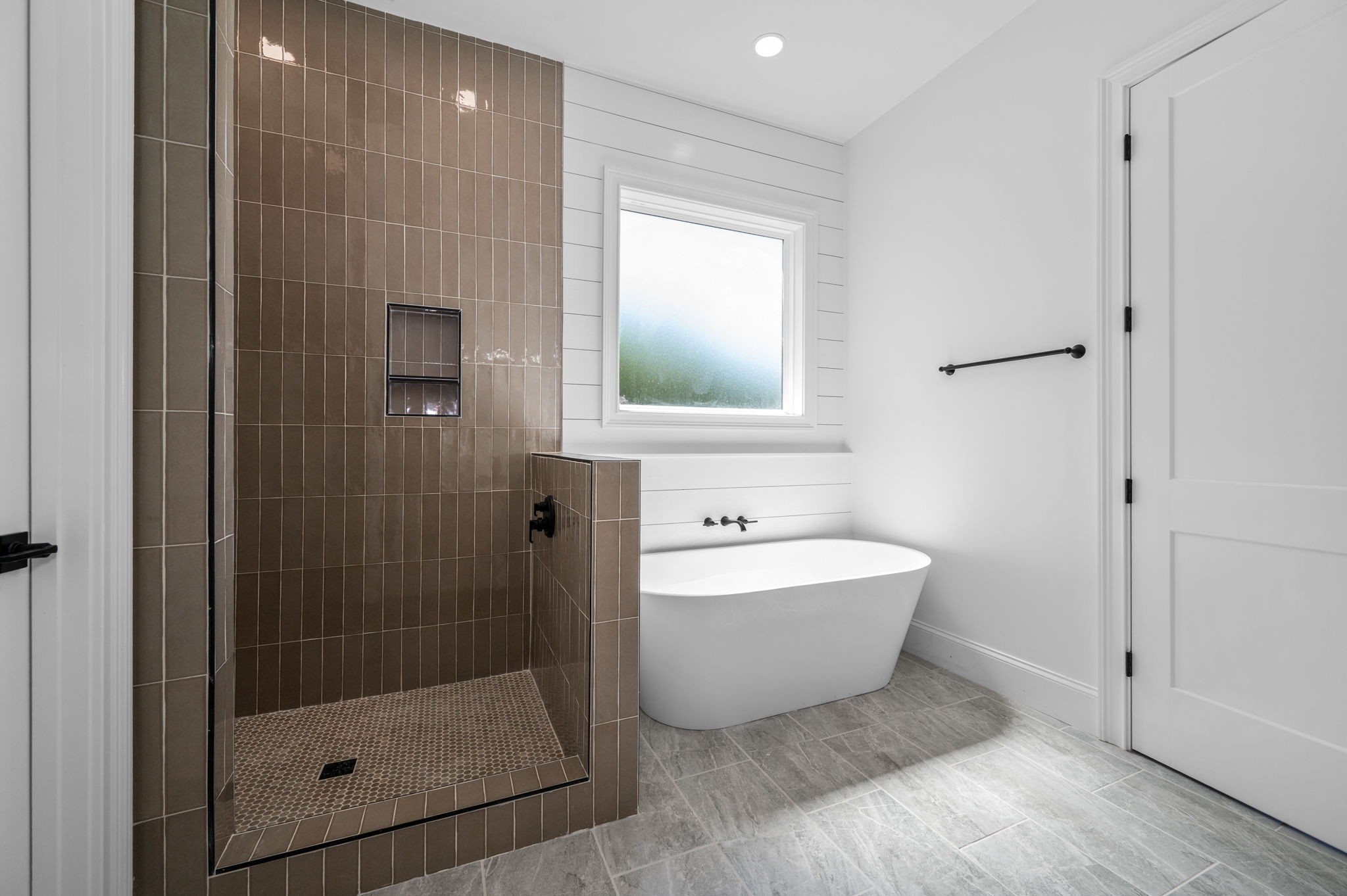 7838 Woodfin Road Christiana, TN 37037 - Photo 34 of 57 a bathroom with a bathtub and shower