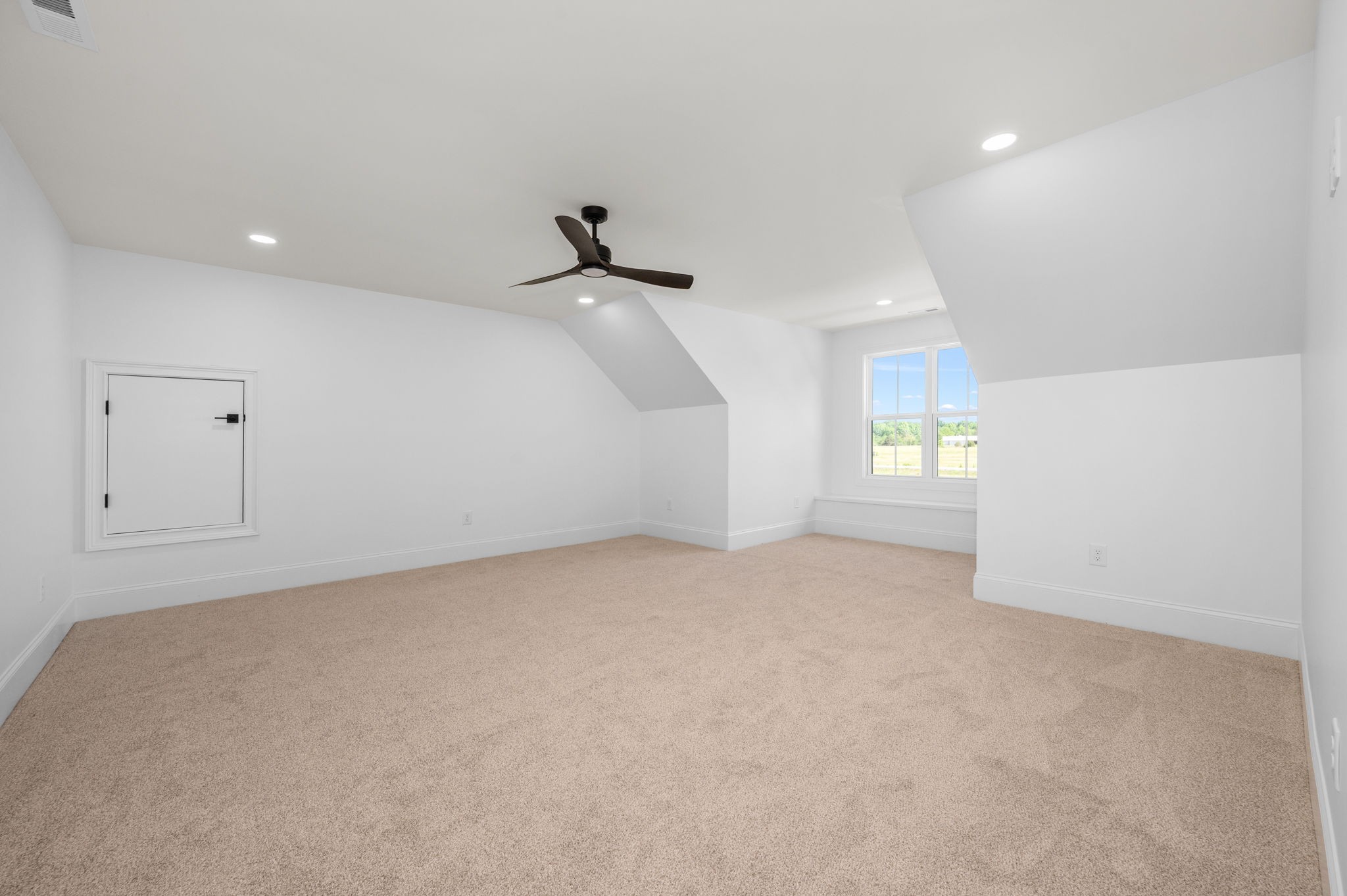 7838 Woodfin Road Christiana, TN 37037 - Photo 39 of 57 wooden floor in an empty room with a window