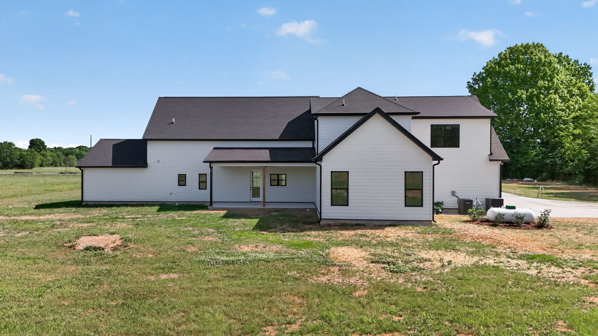 7838 Woodfin Road Christiana, TN 37037 - Photo 41 of 57 a house with yard in front of it