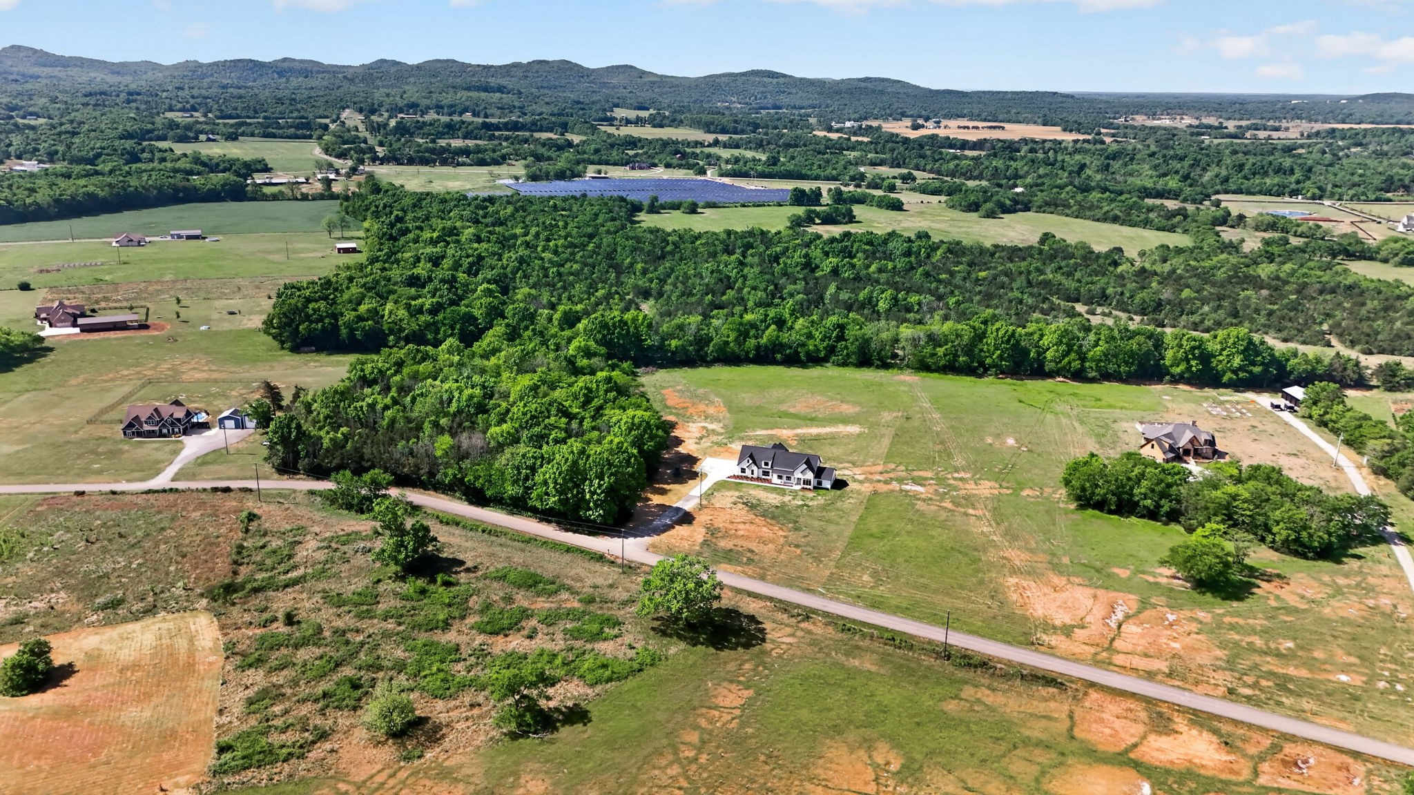 7838 Woodfin Road Christiana, TN 37037 - Photo 46 of 57 an aerial view of a houses with a yard