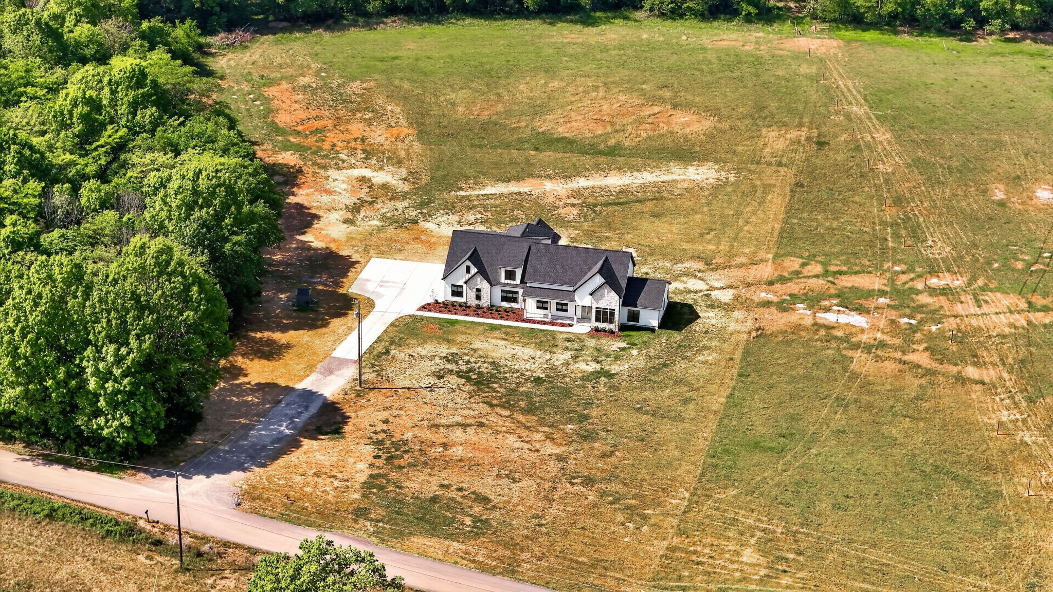 7838 Woodfin Road Christiana, TN 37037 - Photo 47 of 57 a view of a yard with an outdoor space