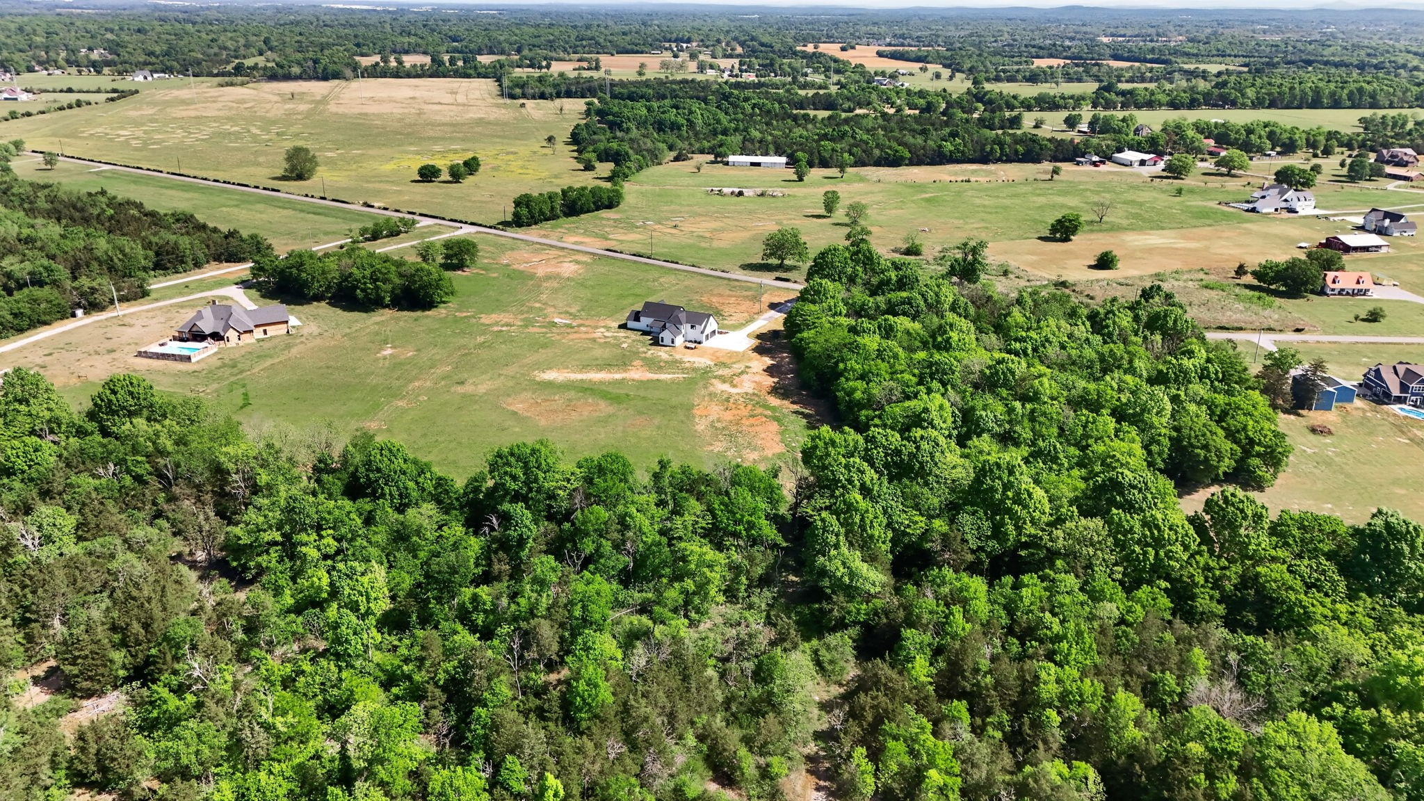 7838 Woodfin Road Christiana, TN 37037 - Photo 51 of 57 an aerial view of ocean and residential houses with outdoor space