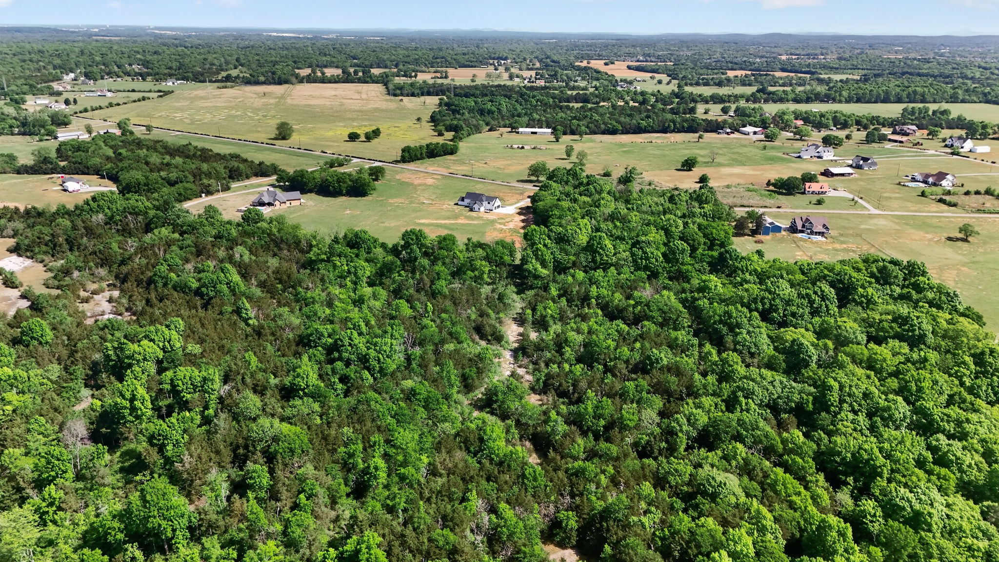 7838 Woodfin Road Christiana, TN 37037 - Photo 52 of 57 an aerial view of ocean with residential house and outdoor space