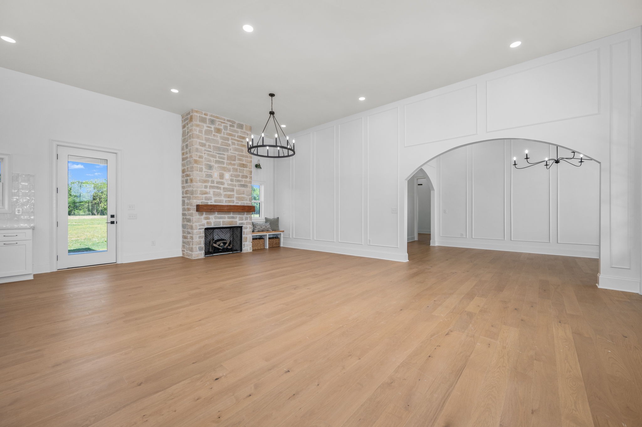 7838 Woodfin Road Christiana, TN 37037 - Photo 6 of 57 an empty room with a fireplace and window