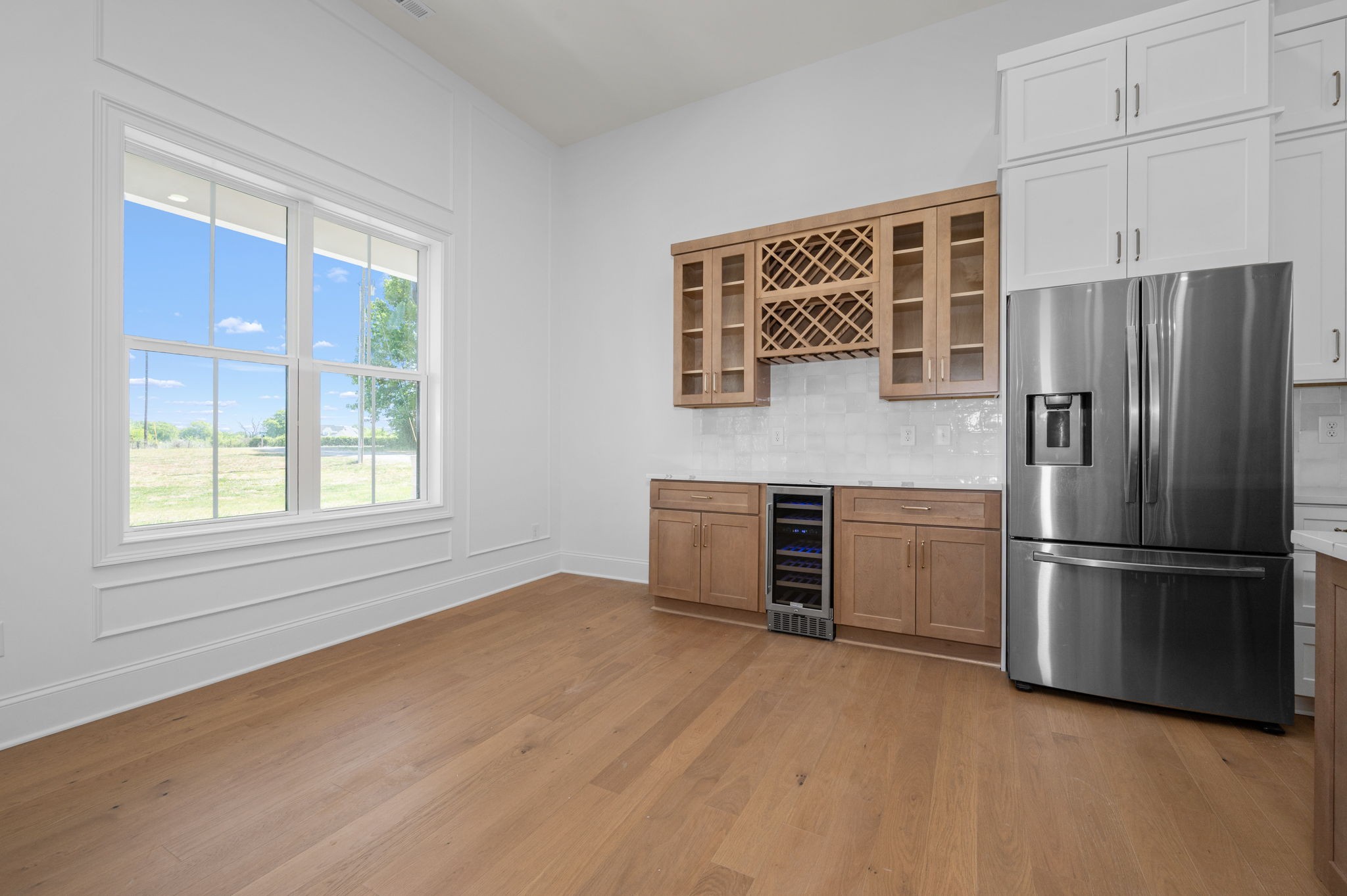 7838 Woodfin Road Christiana, TN 37037 - Photo 8 of 57 a kitchen with stainless steel appliances a refrigerator and a stove top oven