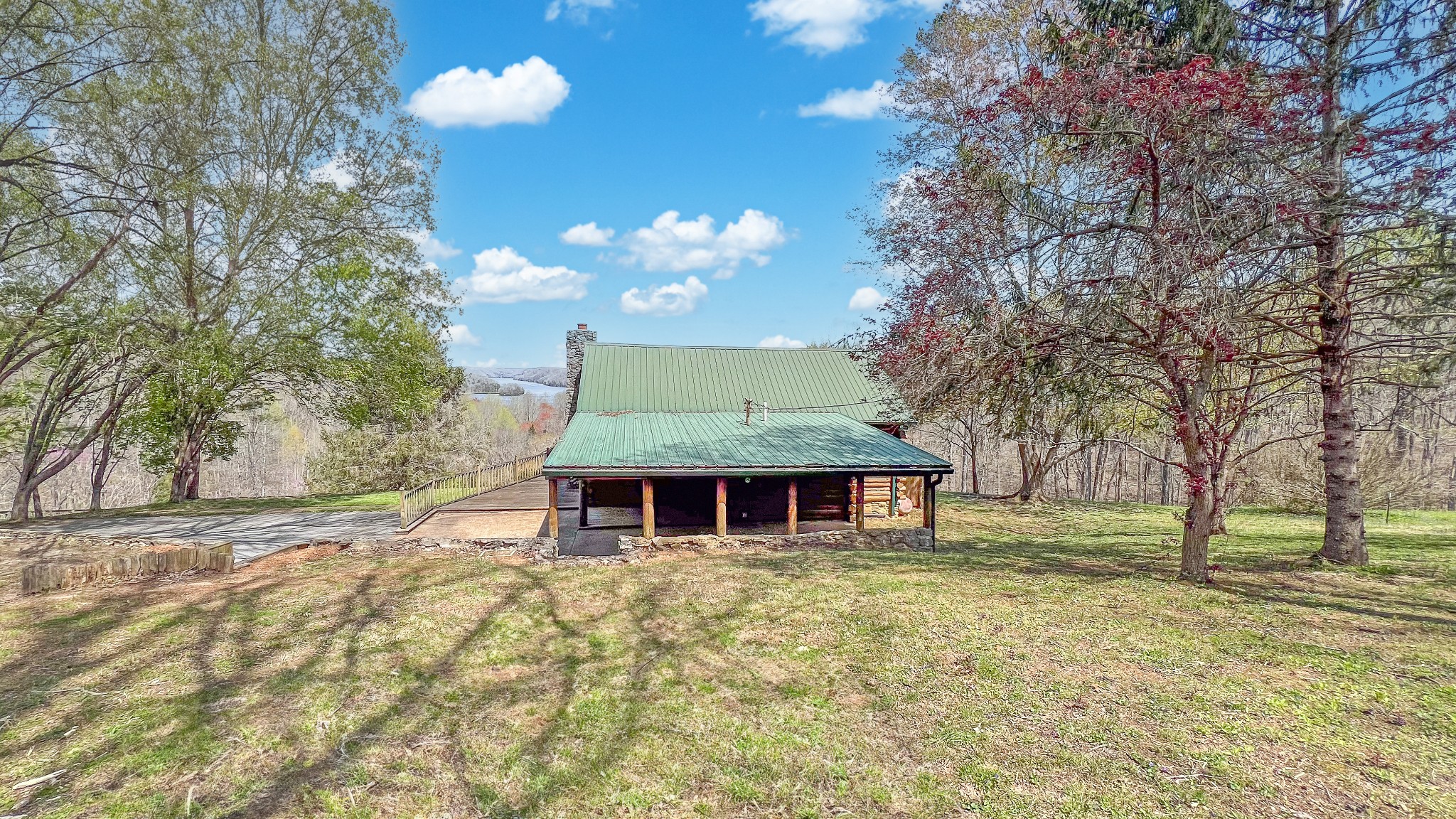 94 Scenic Road Normandy, TN 37360 - Photo 9 of 34 a front view of a house with a yard