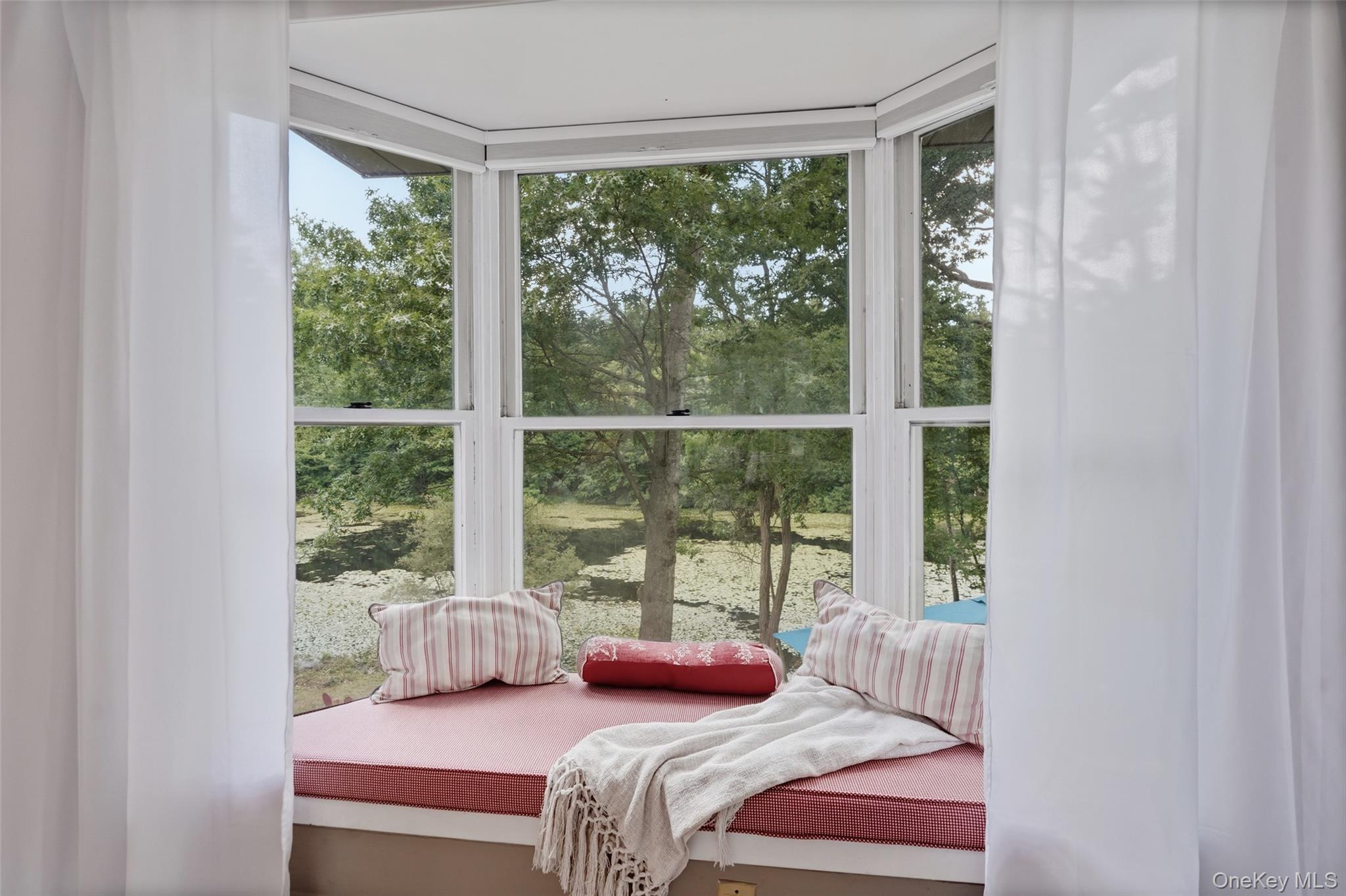 18 Sylvan Road Lake Peekskill, NY 10537 - Photo 17 of 50 Bay window seating area, a perfect reading nook to curl up to