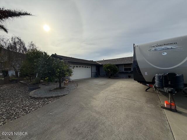 225 Princeton Place Lompoc, CA 93436 - Photo 2 of 5 a view of a room with gym equipment and trees