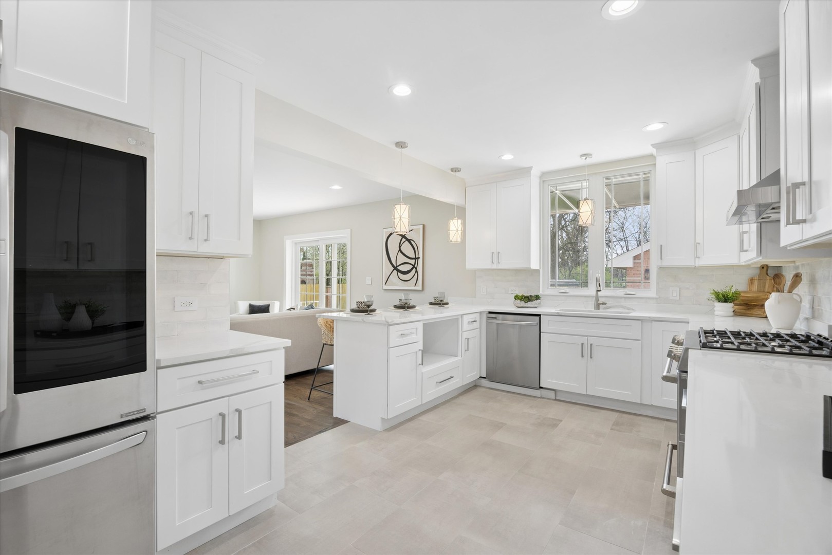 9807 West 57th Street Countryside, IL 60525 - Photo 15 of 48 a kitchen with white cabinets and white appliances