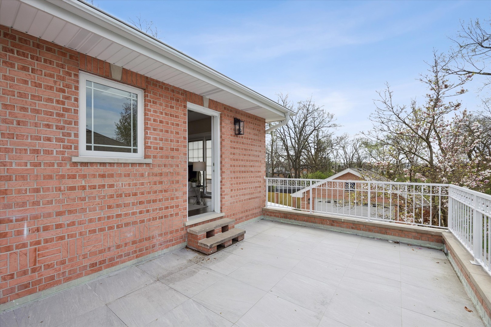 9807 West 57th Street Countryside, IL 60525 - Photo 35 of 48 a view of house with backyard and trees