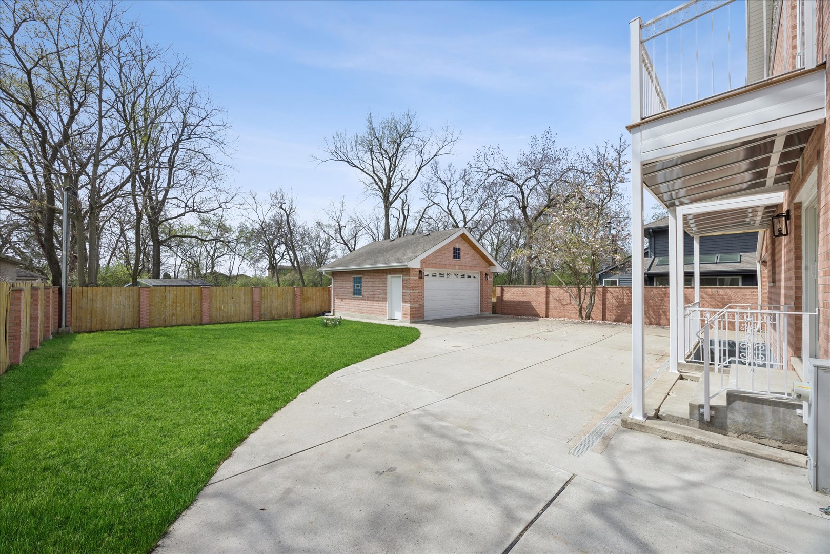 9807 West 57th Street Countryside, IL 60525 - Photo 36 of 48 a front view of a house with a yard and trees