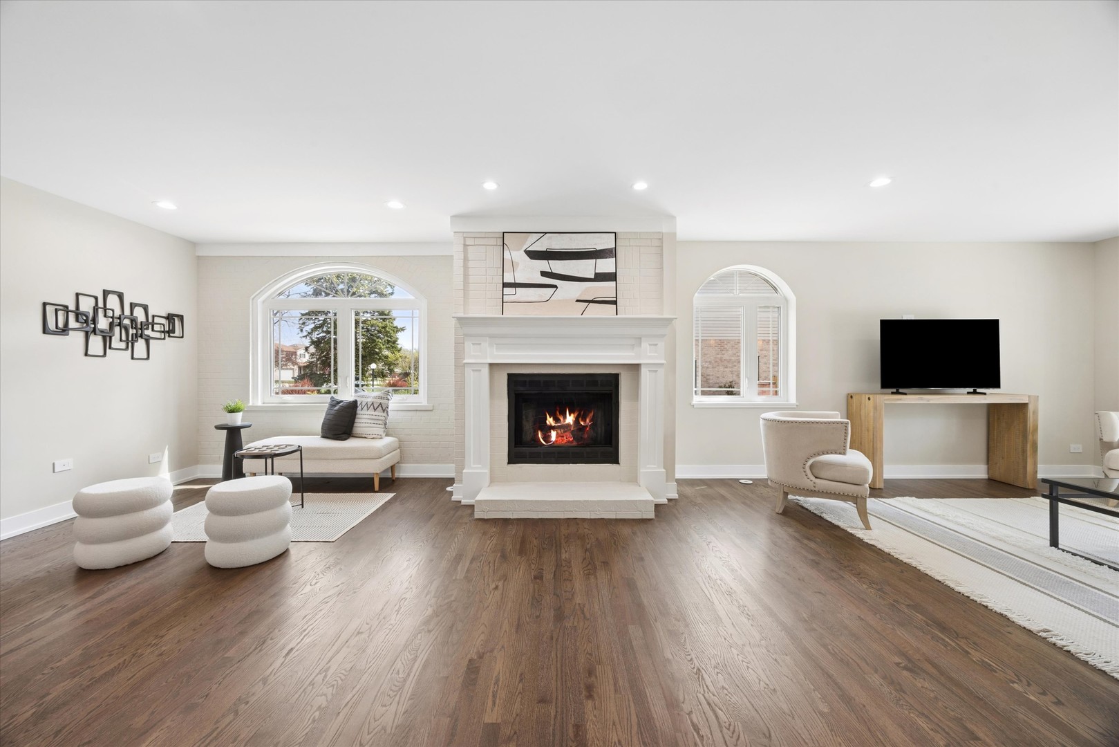 9807 West 57th Street Countryside, IL 60525 - Photo 5 of 48 a living room with furniture and a fireplace