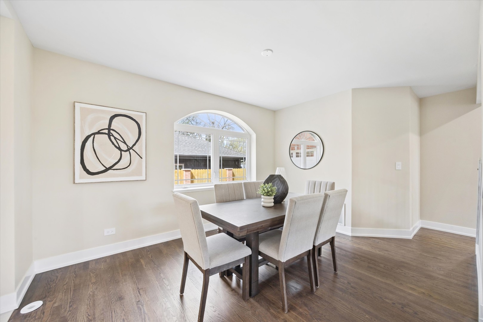 9807 West 57th Street Countryside, IL 60525 - Photo 10 of 48 a view of a dining room with furniture and wooden floor