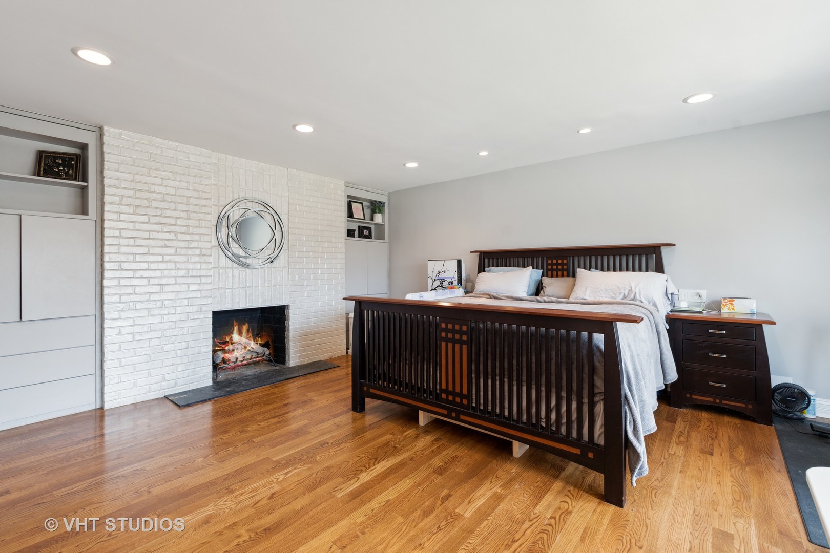 2079 Old Briar Road Highland Park, IL 60035 - Photo 4 of 20 a bedroom with furniture and a fireplace