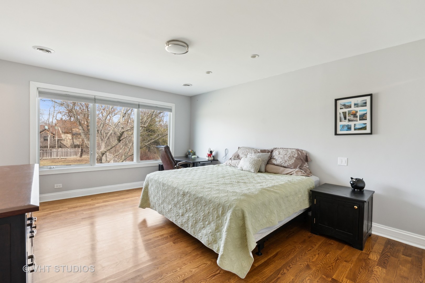 2079 Old Briar Road Highland Park, IL 60035 - Photo 8 of 20 a bedroom with a bed and a large window