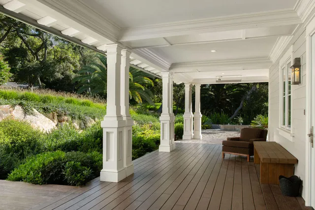 a house view with a sitting space and garden view