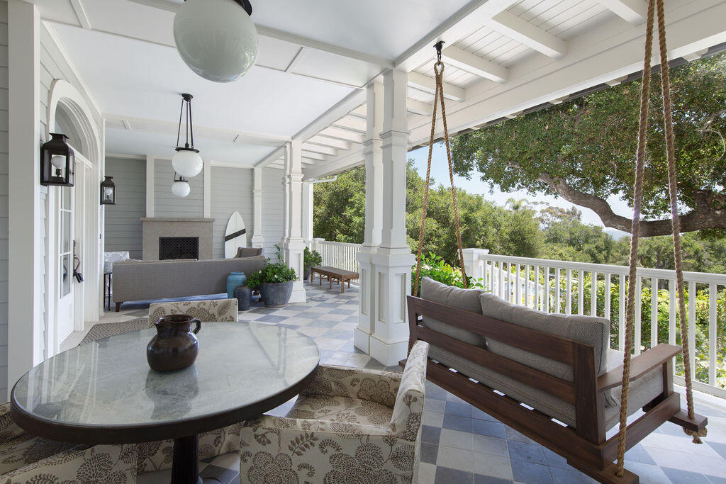 857 Picacho Lane Santa Barbara, CA 93108 - Photo 7 of 46 a living room with furniture a chandelier and a fireplace