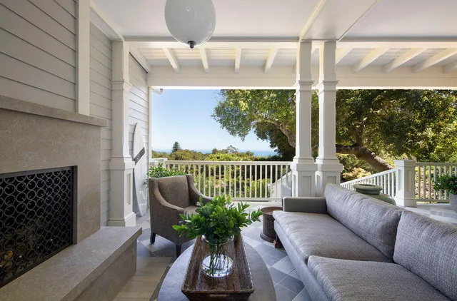 a view of a balcony with furniture