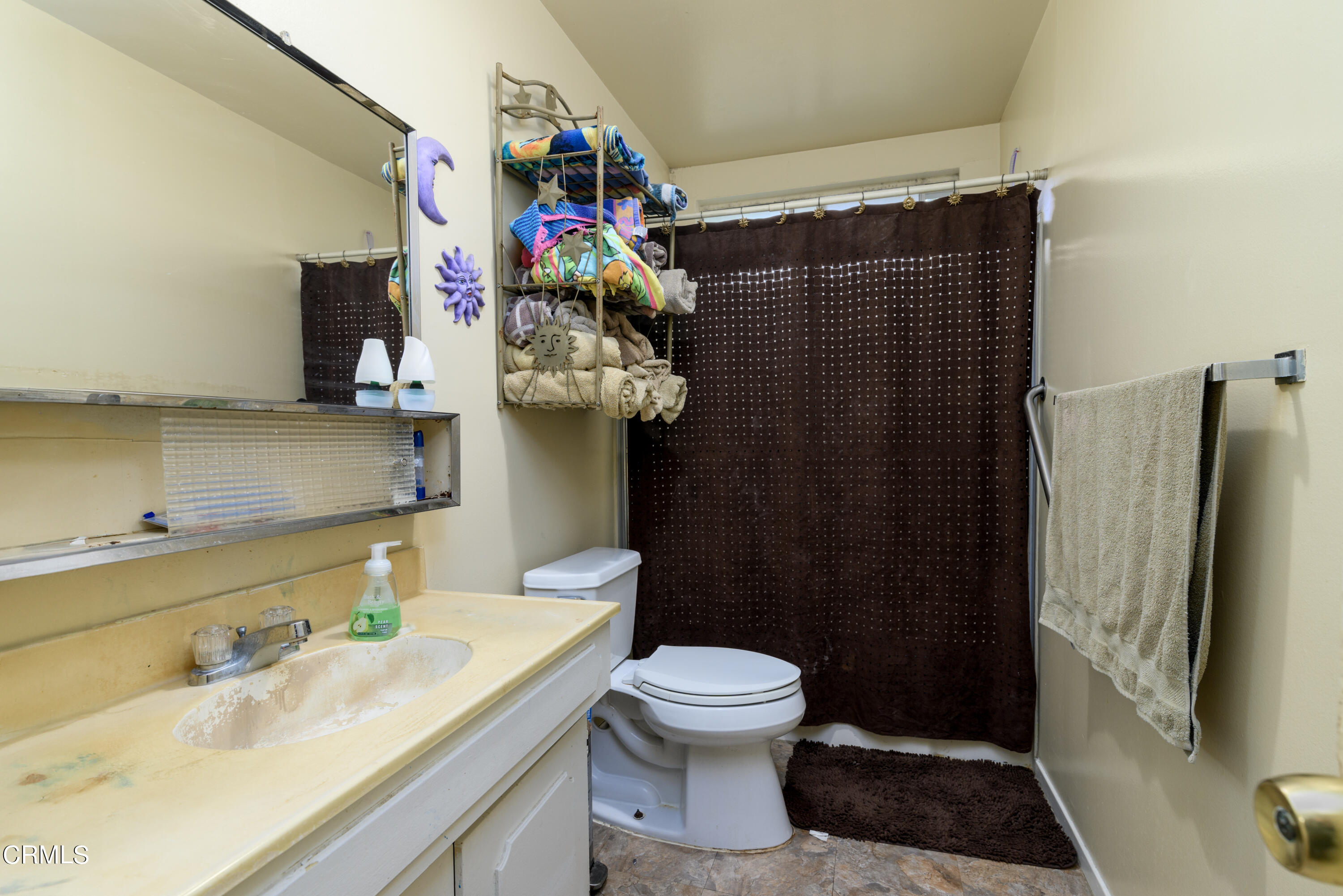 947 Walnut Canyon Road Moorpark, CA 93021 - Photo 8 of 18 a bathroom with a sink toilet and shower