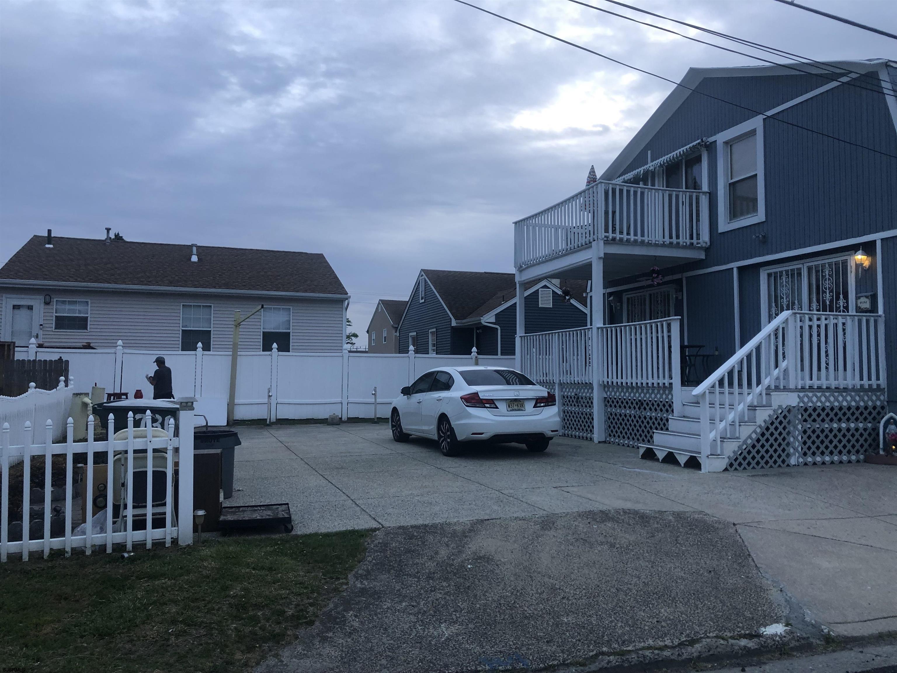 730 Warrena Road Atlantic City, NJ 08401 - Photo 15 of 17 a front view of a house with garden