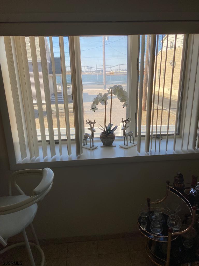 730 Warrena Road Atlantic City, NJ 08401 - Photo 8 of 17 a bathroom with a sink and a large window