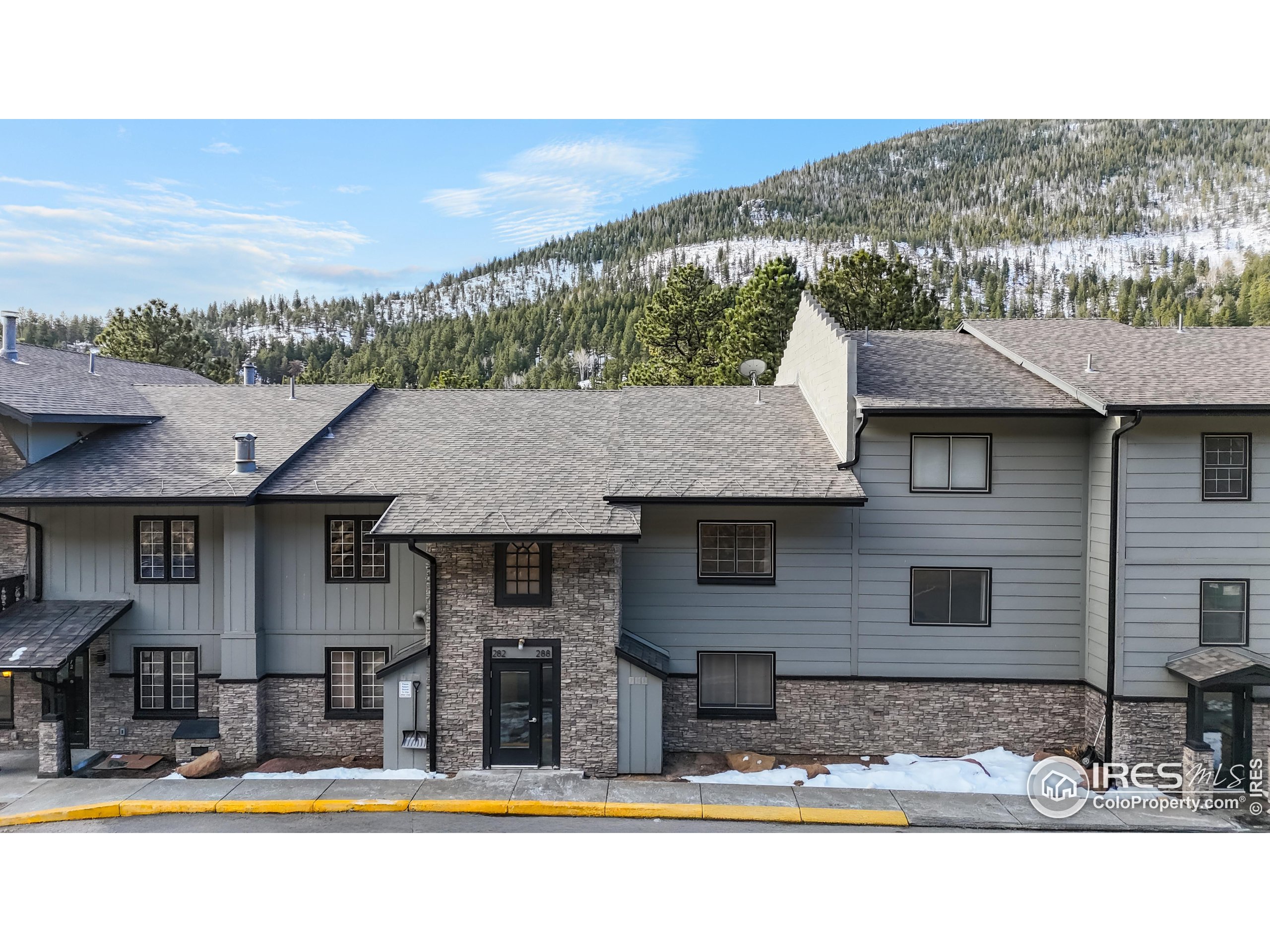 2760 Fall River Road, Unit 288 Estes Park, CO 80517 - Photo 25 of 32 a house view with a outdoor space
