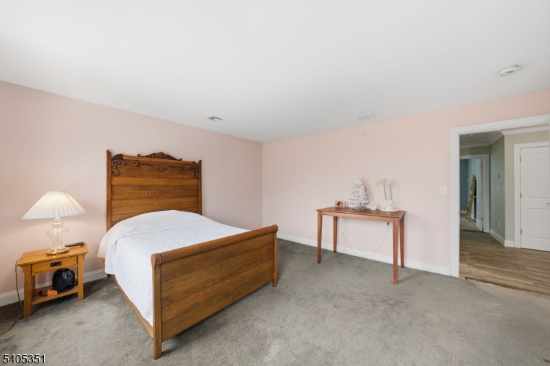 20 Sleepy Hollow Road Denville, NJ 07834 - Photo 31 of 48 a bedroom with a bed and a cabinets