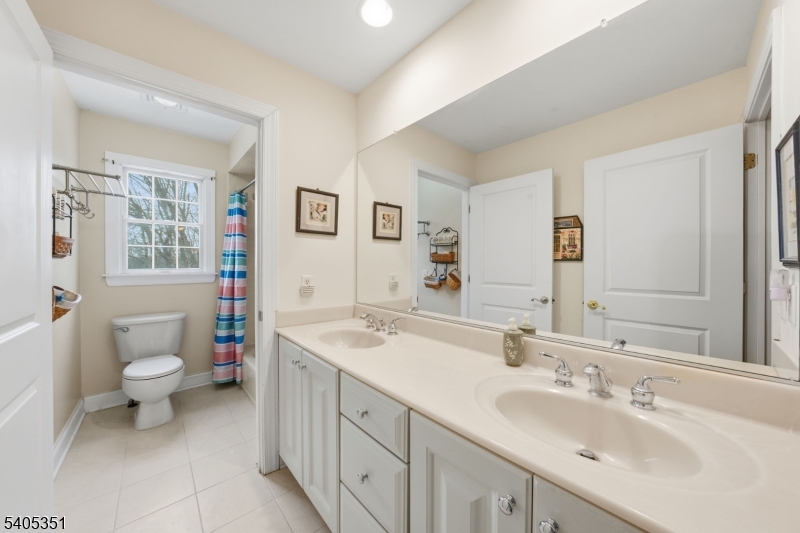 20 Sleepy Hollow Road Denville, NJ 07834 - Photo 35 of 48 a bathroom with a sink toilet and a mirror