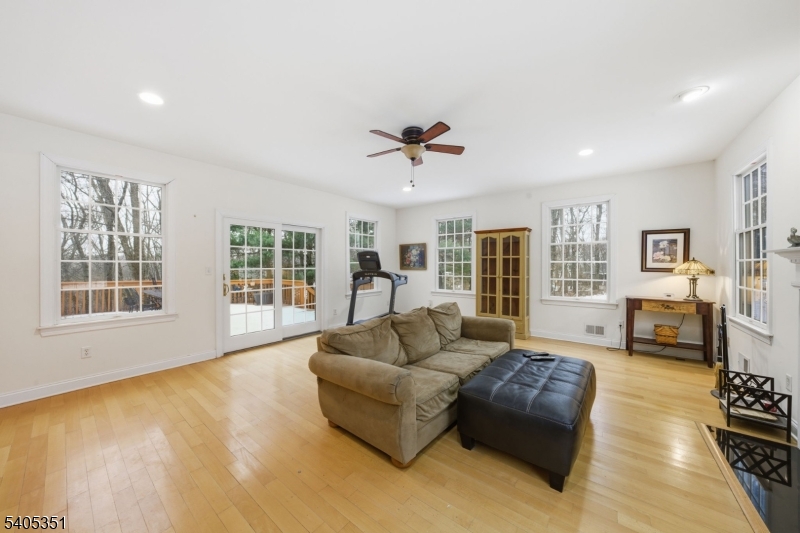 20 Sleepy Hollow Road Denville, NJ 07834 - Photo 10 of 48 a living room with furniture and a large window