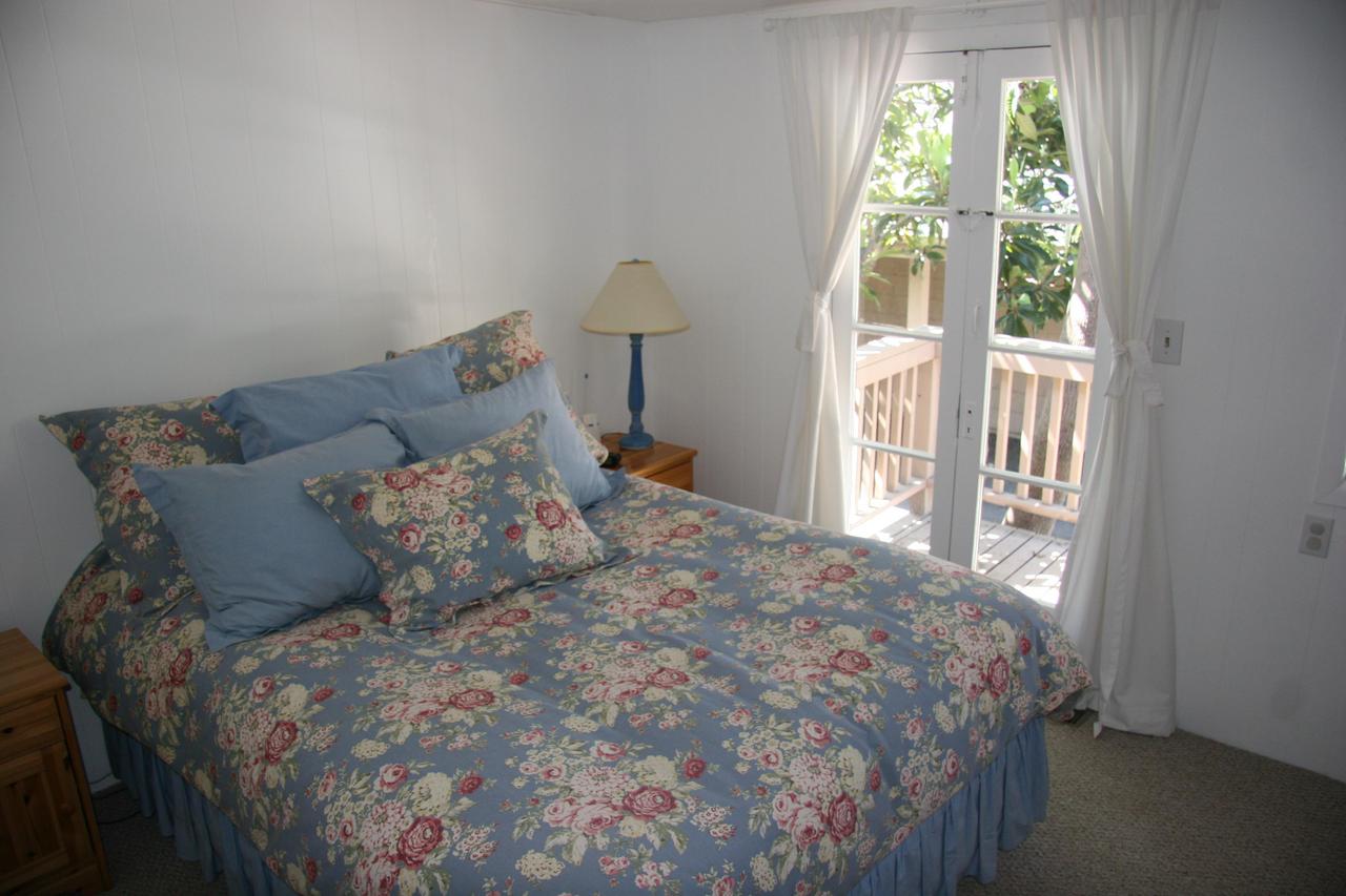 30 South Salinas Street, Unit D Santa Barbara, CA 93103 - Photo 14 of 19 a large bed sitting in a bedroom next to a window