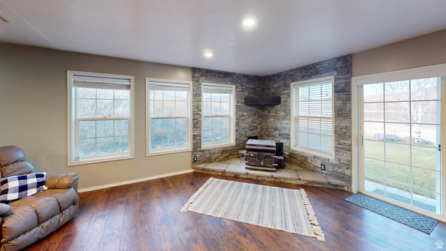 9029 North Treasureton Road Preston, ID 83263 - Photo 11 of 31 Living room featuring wood finished floors and recessed lighting