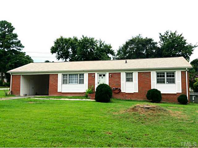 2405 Trawick Road Raleigh, NC 27604 - Photo 1 of 20 a view of a house with backyard